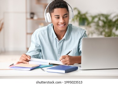 African-American student studying online at home