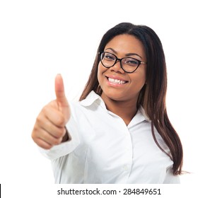 Afro american businesswoman in glasses showing thumb up isolated on a white background. Looking at camera