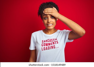 Afro American Woman Wearing Funny T-shirt With Irony Comments Over Isolated Red Background Stressed With Hand On Head, Shocked With Shame And Surprise Face, Angry And Frustrated. Fear And Upset 