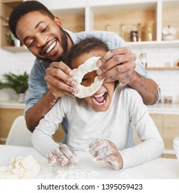 Afro Dad And His Little Daughet Cooking Together, Plaing With Dough, Having Fun