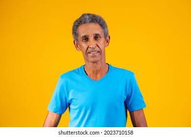 Afro Elderly Man Smiling Looking At Camera With Space For Text