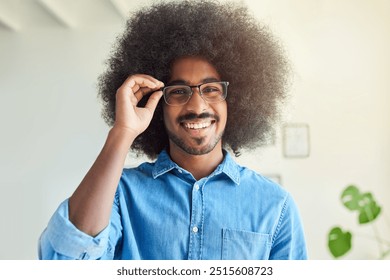 Afro, glasses and portrait with designer man in creative workplace for startup career or profession. Face, small business and smile with happy African developer in office for job as entrepreneur - Powered by Shutterstock