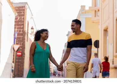 Afro Latino Couple Walking Down The Street