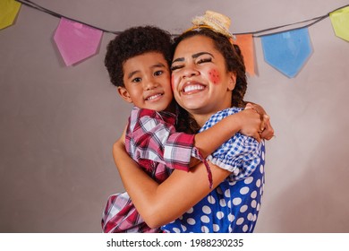 Afro Mother And Son Dressed For June Party