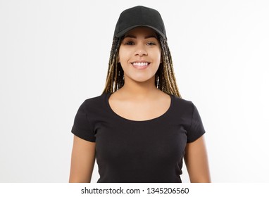 Afro woman in black template t shirt and baseball cap isolated on white background. Blank Sport hat and tshirt. African american girl. Copy space and mock up. Front view