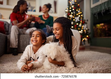 Afro-American Child Enjoy For Christmas Eve With Family At Home 