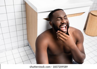 Afro-american Man Suffering From Clenched Jaw