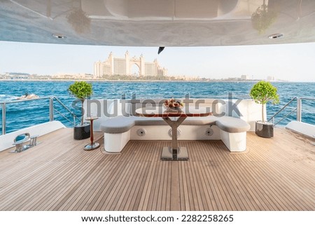Aft deck of a super yacht with teak wood