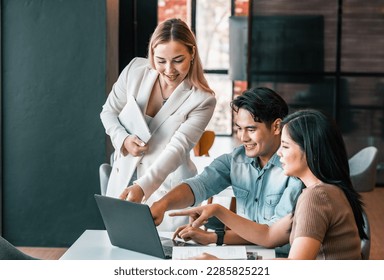 After class, college students discuss, share ideas and thoughts, and learn from each other. Modern and spacious areas in academic libraries that support a more tech-oriented and collaborative society - Shutterstock ID 2285825221