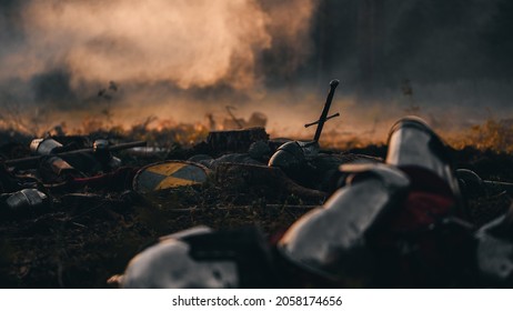 After Epic Battle Bodies of Dead, Massacred Medieval Knights Lying on Battlefield. Warrior Soldiers Fallen in Conflict, War, Conquest, Warfare, Colonization. Cinematic Dramatic Historical Reenactment - Shutterstock ID 2058174656