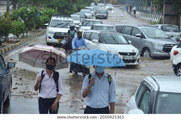 After monsoon rains in\
millennium city Gurugram, waterlogging occurred in Medanta Hospital\
Road, underpass, and traffic jam. Gurgaon, Haryana, India. July 19,\
2021.