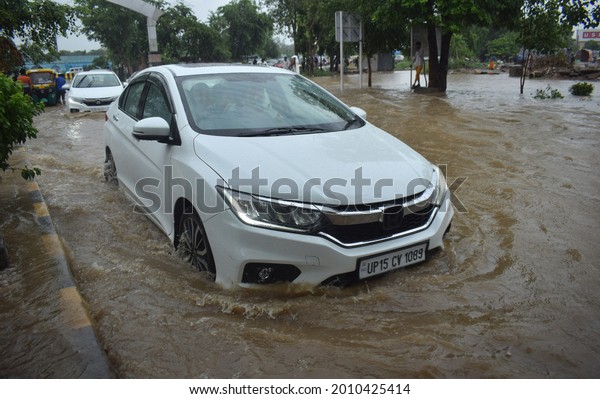 After monsoon rains in\
millennium city Gurugram, waterlogging occurred in Medanta Hospital\
Road, underpass, and traffic jam. Gurgaon, Haryana, India. July 19,\
2021.