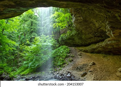  After The Rain. Standing behind beautiful Memorial Falls as the suns rays illuminate the waterfall. Munising, Michigan   - Powered by Shutterstock
