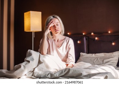 After Sleepless Night Sad 40s Woman Got Up Sit On Bed Thinking, Lost In Sad Thoughts About Irreparable Mistake Decision About Abortion, Feeling Remorse, Break Up In Relations, Divorce And Jealousy 