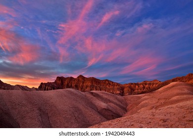 After sunset with pink clouds at Golden Canyon in Death Valley National Park