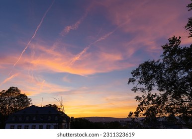 After a very hot day torturing the citizens of Mainz, a spectacular sunset happenend, granting them a sweet end of the day. - Shutterstock ID 2311323619