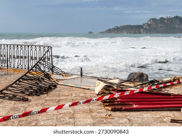 the aftermath of a powerful and devastating hurricane on a sea shore. sea coast embarkment after strong typhoon with ruins and distrustions