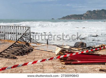 the aftermath of a powerful and devastating hurricane on a sea shore. sea coast embarkment after strong typhoon with ruins and distrustions