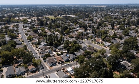 Afternoon aerial view of a suburban neighborhood of Elk Grove, California, USA.