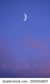 Afternoon Moon Above Pink Clouds