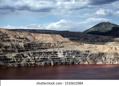 Afternoon Sun Shines On The Rim Of The Berkeley Pit Superfund Site In Butte, Montana.