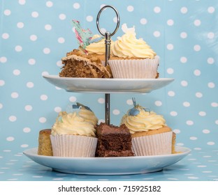 Afternoon Tea Cakes On A Stand On A Blue Background