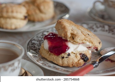 Afternoon Tea With Cream Scone On Fine China