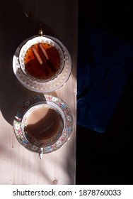 Afternoon Tea At Home On Rough Spruce Table - Viewed From Above In Bright Sunlight