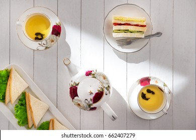 Afternoon Tea Table. Tea Set With Sandwiches