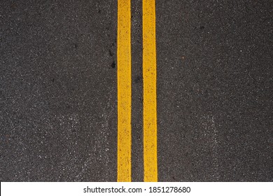 Afternoon View Of The Median Road Lines In The Street