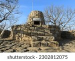 Afternoon view of stone stairs and beacon tower on Bunsanseong Fortress of Bunseongsan Mountain near Gimhae-si, South Korea
