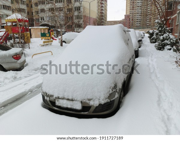And again winter has come. All cars were covered\
with snow.