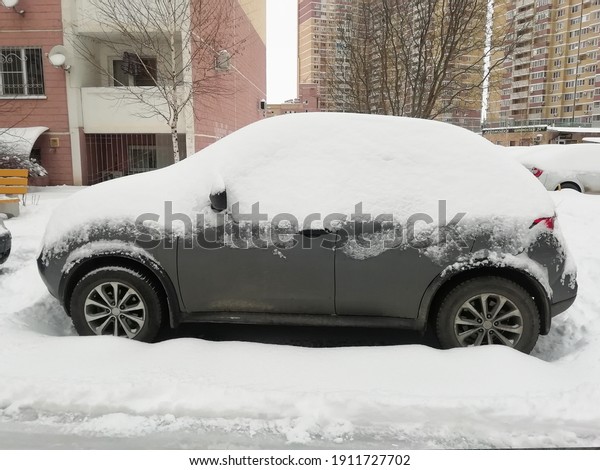 And\
again winter has come. The car was covered with\
snow.