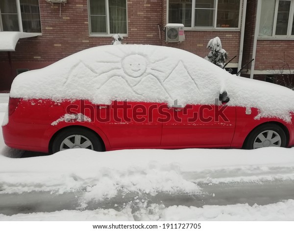 And\
again winter has come. The car was covered with\
snow.