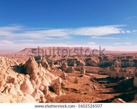 against the background of a wonderful Cappadocia
volcanic valley Stok fotoğraf © 