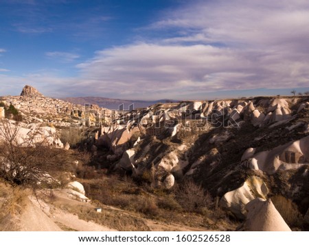 against the background of a wonderful Cappadocia
volcanic valley Stok fotoğraf © 