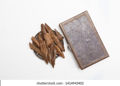 Agarwood, Incense Chips Around A Leather Box, It's Name In Arabic Oud Wood Used To Incense Cloths, Furniture And Places For Occasions 