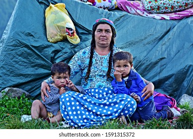 Agas Village/Romania-August 21st: The Reunion Of A Gypsy Extended Family. Gypsies In Romania Still Live A Semi-nomadic Life, Moving From Village To Village In Summer And Going Back Home For Winter.