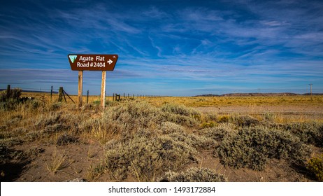 Agate Flat Sign On Granite Mountains Prairie Of Sagebrush And Blue Morning Sky