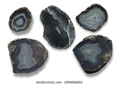 Agate Gemstone Slice. Natural Half Of Almond Agate. Saw Cut Slab Crystalline Texture Of The Stone Background With Gray Pastel Colors, Beautiful White Fortress Band