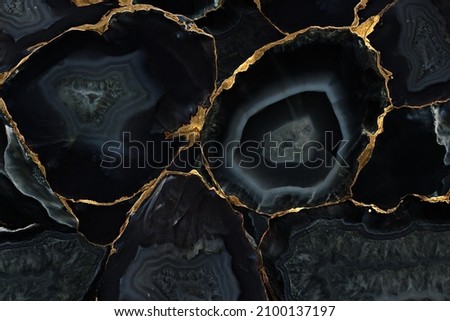 Agate Gemstone slices, marble texture in kintsugi style cracks and craquelure. Golden metallic swirls veins, slab crystalline texture of the natural stone for use as abstract background for design