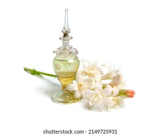 Agave amica, formerly Polianthes tuberosa or tuberose. With perfume bottle. Isolated on white background.