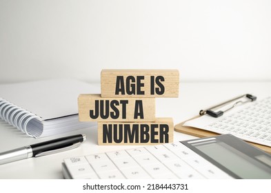 Age Is Just A Number Words On Wooden Blocks And Hand