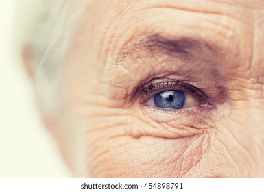 Age, Vision And Old People Concept - Close Up Of Senior Woman Face And Eye