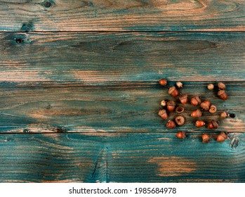 Aged Acorns On Faded Blue Wood Planks For Either A Halloween Or Thanksgiving Holiday Concept Background