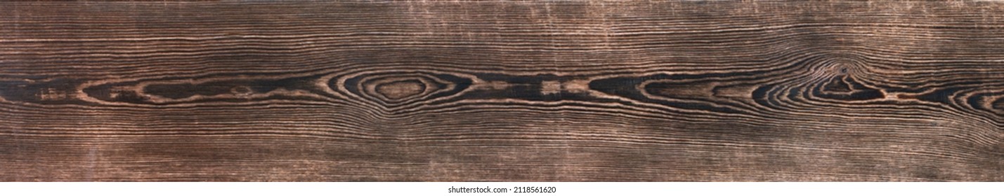 Aged, burned rustic braun dark pine wood texture. Boards with a knot. Grunge rough texture, wood texture. Scorched aged plank. Large size, banner - Shutterstock ID 2118561620