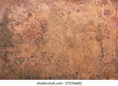 Aged copper plate texture, old worn metal background.