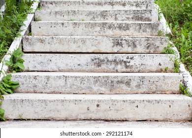 Aged Grey Stone Stairway. Stepping Stones. Side View, Summer. Day Light. Soft Focus, Grass Background