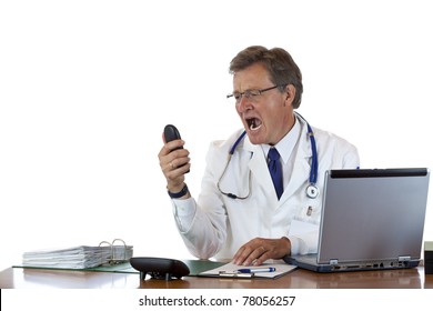 Aged male doctor in office has stress and screams into telephone.. Isolated on white background.