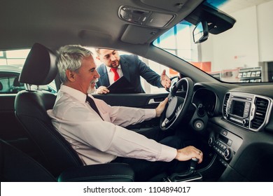 Aged Man Buy Car With Dealer.